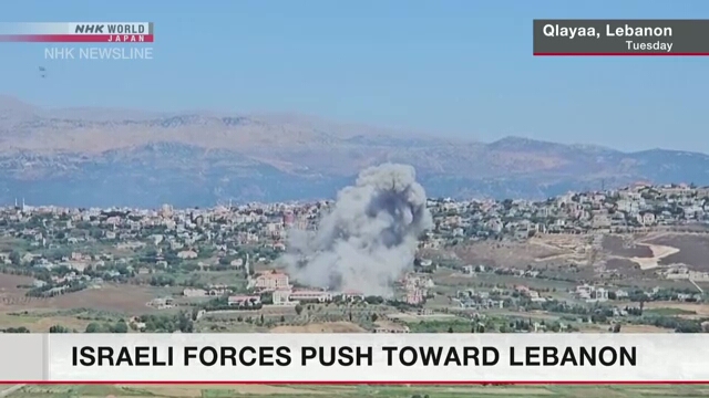 Israeli forces push toward border with Lebanon