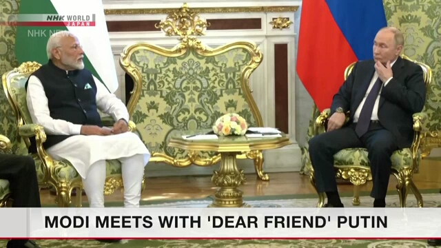 Modi meets with 'dear friend' Putin