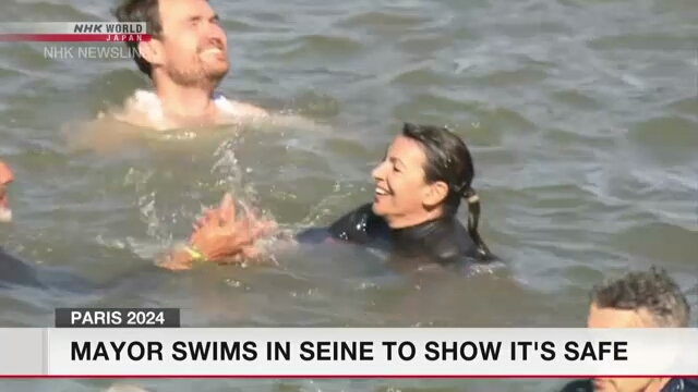 Mayor swims in Seine to show it's safe ahead of Olympics