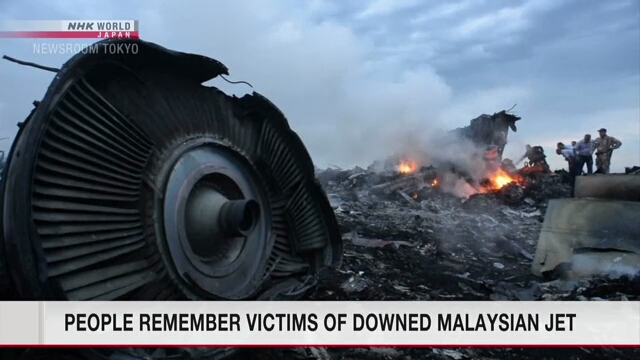 People remember victims of downed Malaysian jet