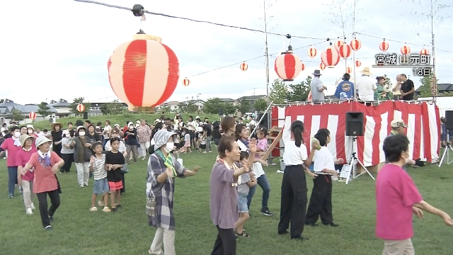 People in tsunami-hit northeastern Japanese town hold summer festival