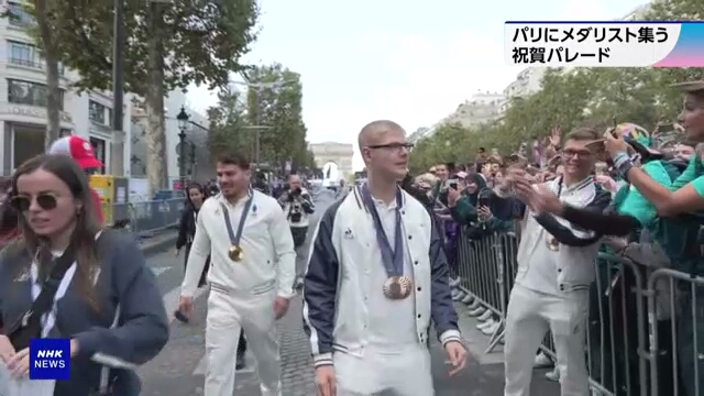 French medalists of Paris Games honored in grand parade