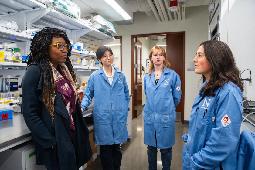 Ludmilla Aristilde (from left) and her researchers Nanqing Zhou, Rebecca Wilson and Kelly Teitel at their Northwestern University laboratory. 