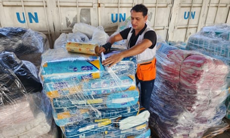 Aid is prepared for distribution to Palestinians in an Unrwa warehouse in the Gaza Strip.