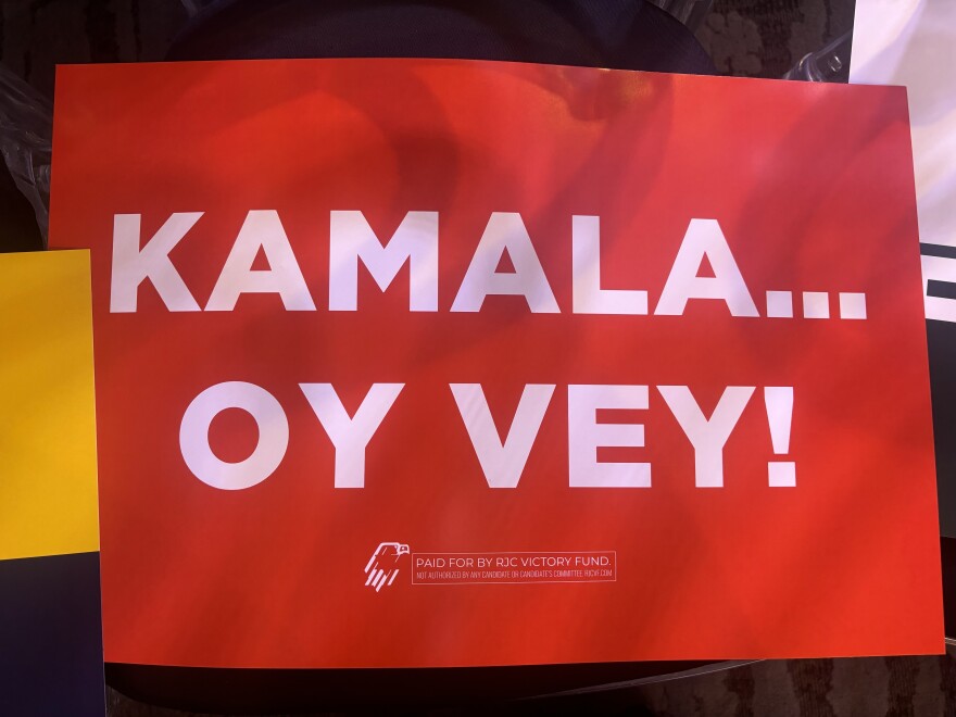 A sign reading "Kamala – Oy Vey" was on display outside a recent appearance by Sen. Norm Coleman, national chairman of the Republican Jewish Coalition, in suburban Detroit on Monday. Republicans see an opportunity this election to win over Jewish voters in key states.