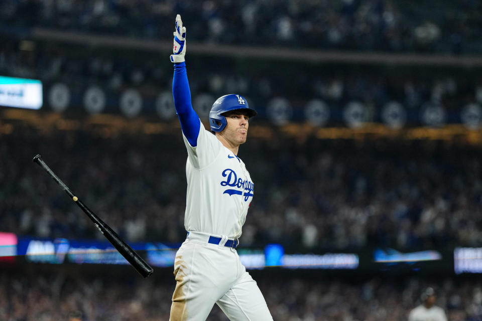 LOS ANGELES, CA - OCTOBER 25: Freddie Freeman #5 of the Los Angeles Dodgers reacts after hitting a walk-off grand slam in the tenth inning of Game 1 of the 2024 World Series presented by Capital One between the New York Yankees and the Los Angeles Dodgers at Dodger Stadium on Friday, October 25, 2024 in Los Angeles, California. (Photo by Daniel Shirey/MLB Photos via Getty Images)