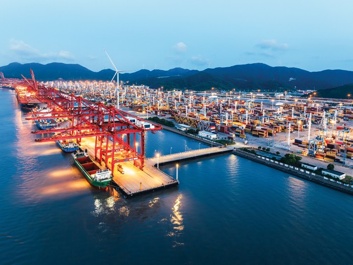 A port illuminated at night.