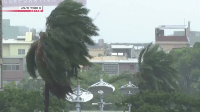 Taiwan reports casualties as typhoon brings strong winds and rains