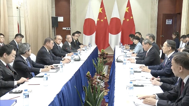 Leaders of Japan, China agree to continue communications at all levels