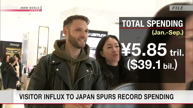 Visitor influx to Japan spurs record spending