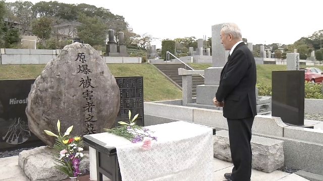 Tokyo-based hibakusha group visits graves to share news of Nobel Peace Prize