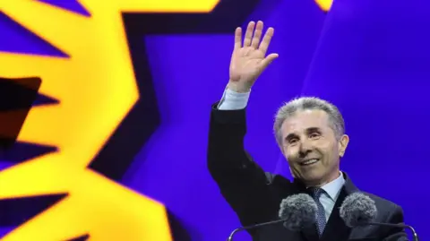 GIORGI ARJEVANIDZE/AFP Georgian oligarch Bidzina Ivanishvili attends the final campaign rally of the ruling Georgian Dream party in Tbilisi on October 23, 2024