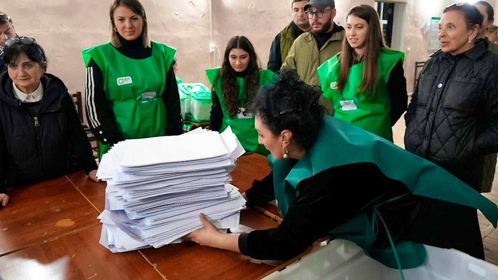 ARCHIVE - Members of an election commission prepare to count the ballots at a polling station in Tbilisi after the parliamentary elections in Georgia. Photo: Kostya Manenkov/AP/dpa