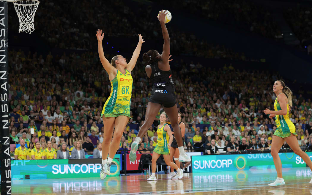 Grace Nweke of New Zealand gathers the ball under pressure from Courtney Bruce of Australia during the Constellation Cup match between the Australian Diamonds and the New Zealand Silver Ferns at RAC Arena in Perth, Sunday, October 27, 2024. (AAP Image/Richard Wainwright/ Photosport)