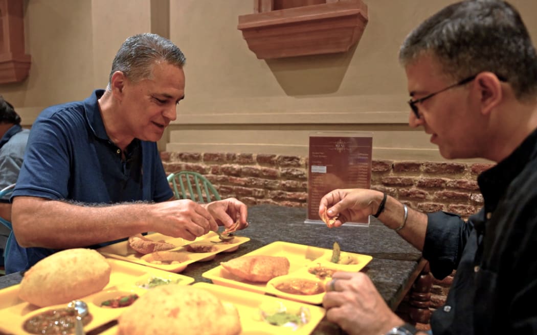 Patrick Rata tries Chole Bhature, a famous Indian dish in Delhi.