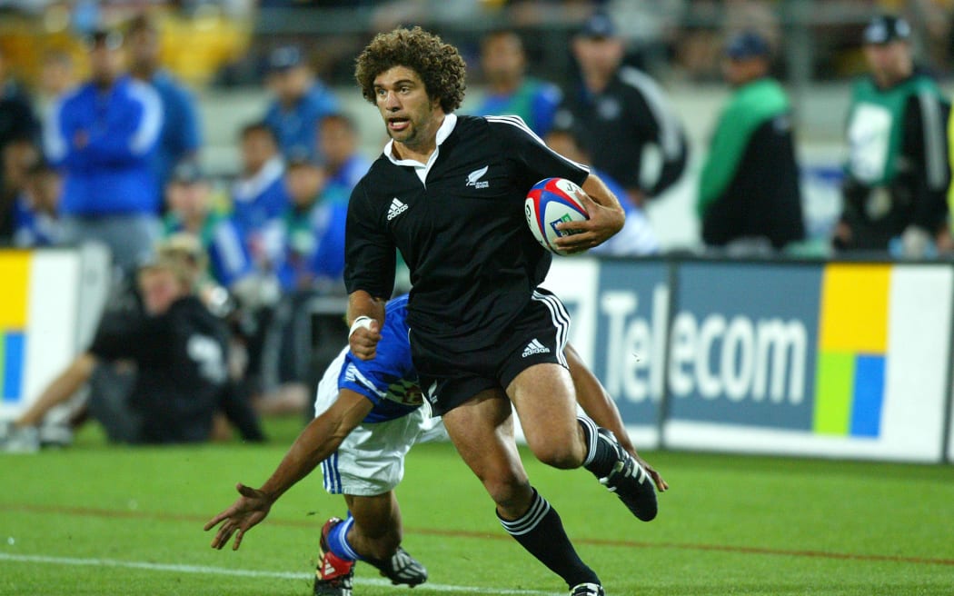 06 February 2004, Westpac Stadium, Wellington, IRB New Zealand Sevens.New Zealand vs SamoaNew Zealand's captain Matua Parkinson gets tackled by Samoa's David Lemi during New Zealand's 21-7 win over Samoa on Friday.Please Credit: Marty Melville/Photosport