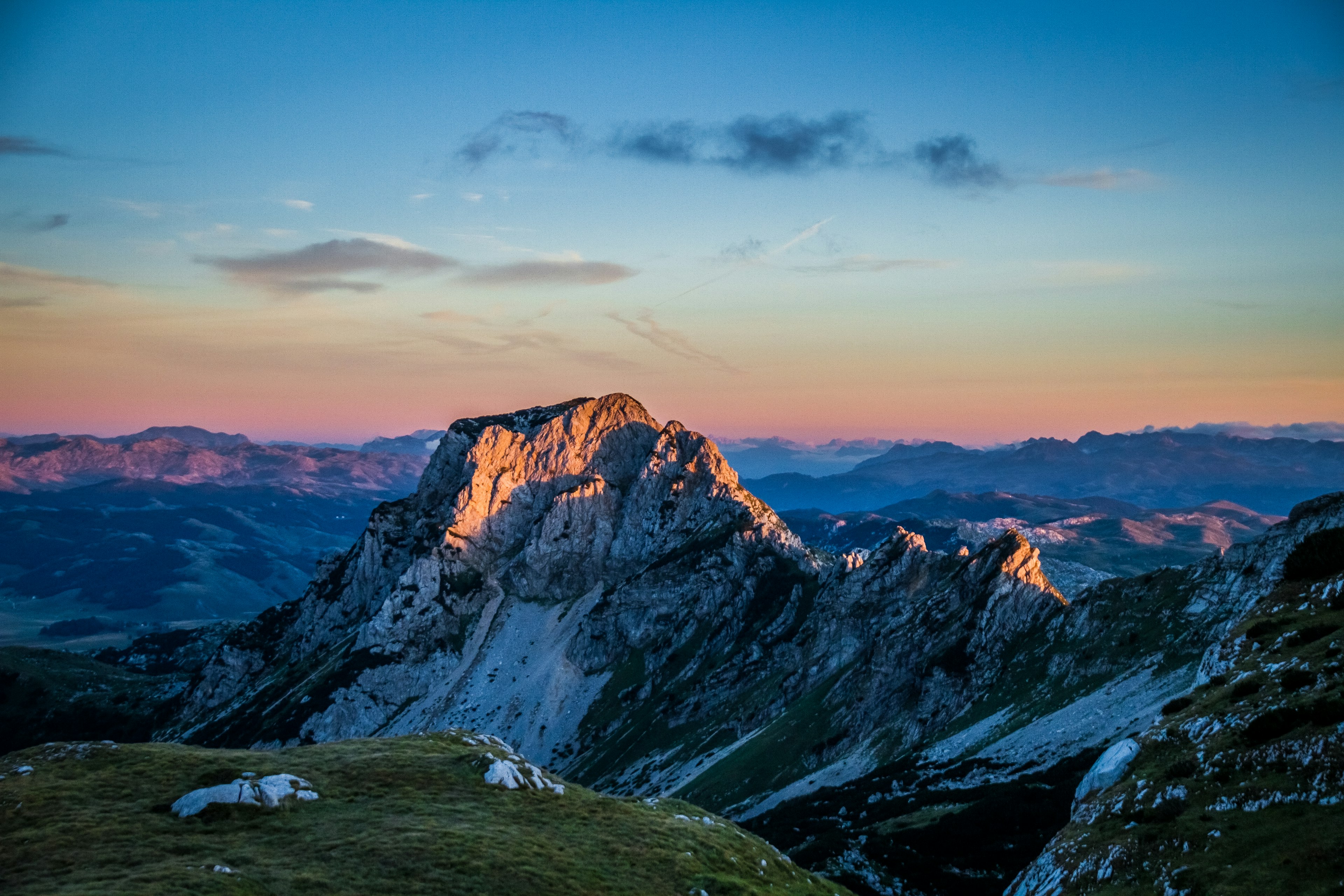 A mountain landscape at sunset