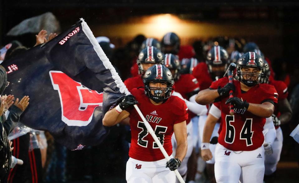 Lafayette Jeff Bronchos take to the field Friday, Sept. 27, 2024, during the IHSAA football game against the Richmond Red Devils at Lafayette Jeff High School in Lafayette, Ind. Lafayette Jeff Bronchos won 70-0.