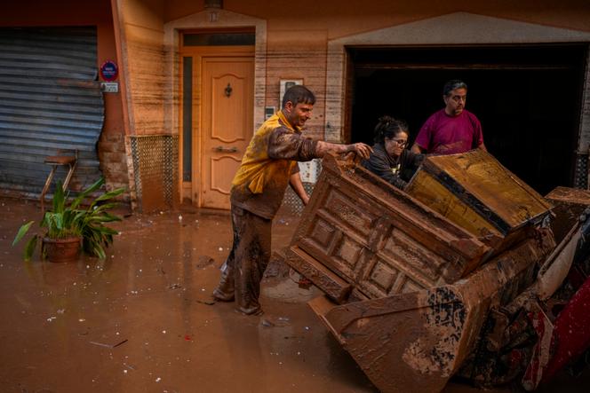 On a mud-flooded street in Utiel, Spain, October 30, 2024.