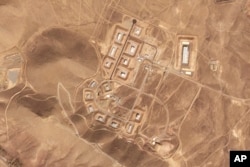 This satellite photo from Planet Labs PBC shows damaged buildings at Iran's Khojir military base outside of Tehran, Oct. 8, 2024. (Planet Labs PBC via AP)