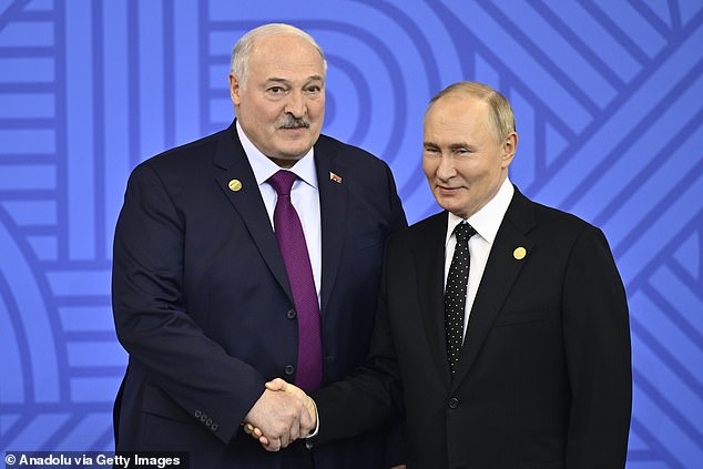 Russian President Vladimir Putin (R) greets Belarus President Alexander Lukashenko