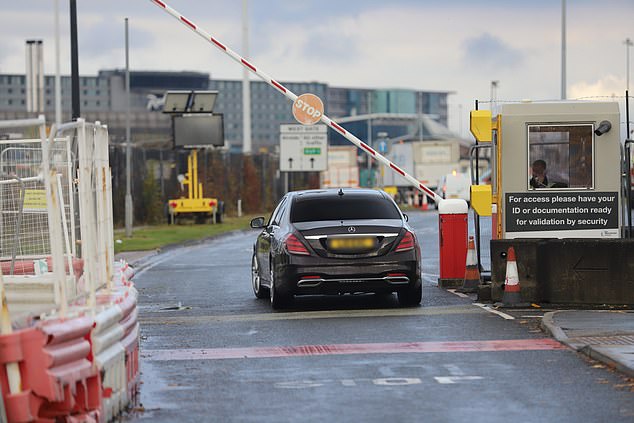 The Dutchman, sat in the back, ducked down before heading into the airport via his chaffeur