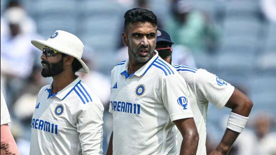 India's Ravichandran Ashwin looks on after taking the wicket of New Zealand's Devon Conway during the first day of the second Test against New Zealand in Pune on Thursday. (AFP)