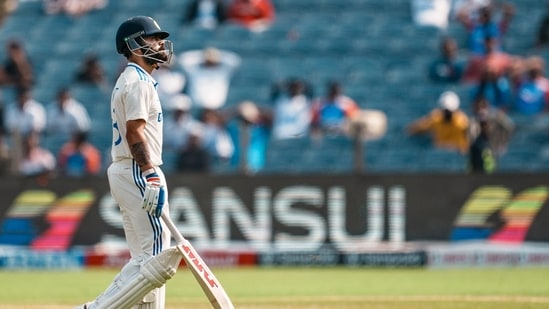 India's Virat Kohli returns to pavilion after being dismissed by New Zealand's Mitchell Santner on the second day of the second test cricket match between India and New Zealand, at the Maharashtra Cricket Association Stadium, in Pune, Friday, Oct. 25, 2024(PTI)