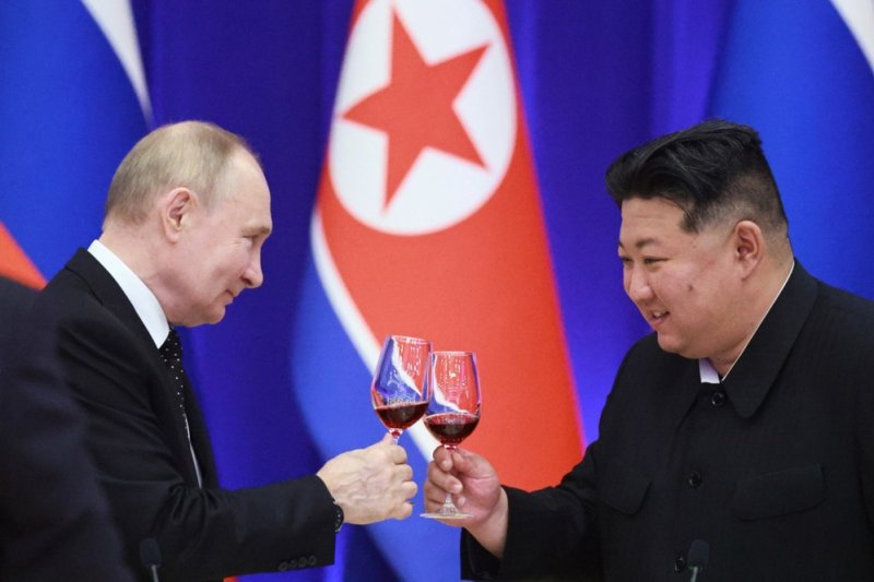 Russian President Vladimir Putin (L) and North Korean leader Kim Jong Un make a toast in Pyongyang, North Korea, on June 19. North Korea is sending about 10,000 soldiers to Russia to help defeat Ukraine and some troops already are deployed near Ukraine, multiple sources say. File Photo by Vladimir Smirnov/Sputnik/Kremlin Pool/EPA-EFE