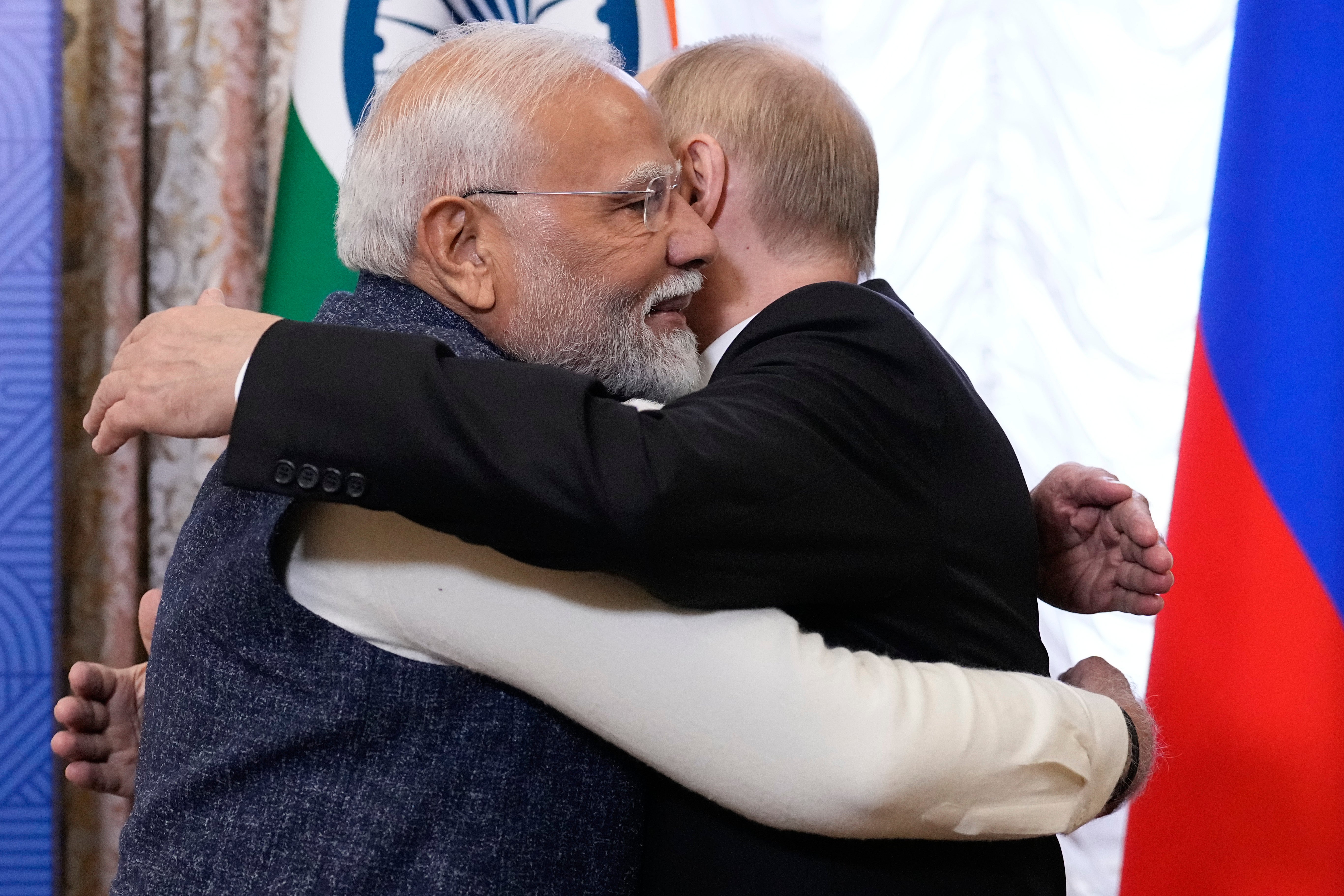 Narendra Modi and Vladimir Putin hug at the Brics summit in Kazan, Russia, on 22 October 2024