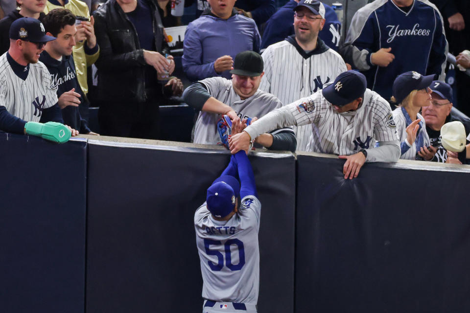 These Yankees fans certainly tried their best to stop Mookie Betts from making the out on Tuesday.