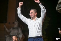 Hristijan Mickoski, leader of North Macedonian opposition party VMRO-DPMNE, addresses supporters in Skopje on May 8, 2024.