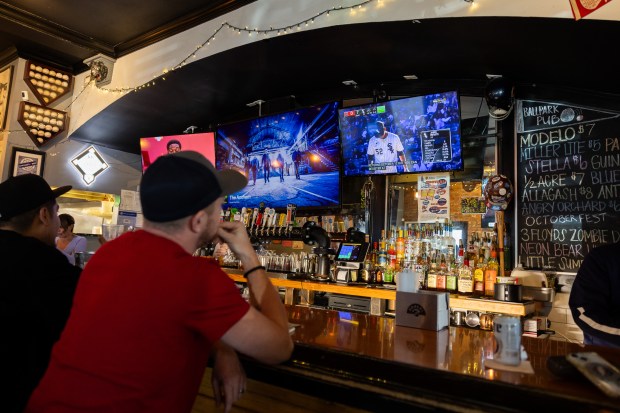 White Sox fan Joe Isbell watches a game against the Angels at BallPark Pub in Chicago on Sept. 26, 2024. (Tess Crowley/Chicago Tribune)