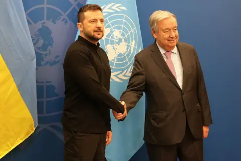 EPA-EFE/REX/Shutterstock Ukrainian President Volodymyr Zelensky (left) shakes hands with UN Secretary General António Guterres in New York City. Photo: 23 September 2024