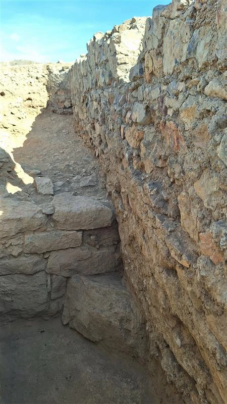 The massive mortar wall of the recently discovered ancient church believed to be the oldest in Armenia. Credit: AGAP