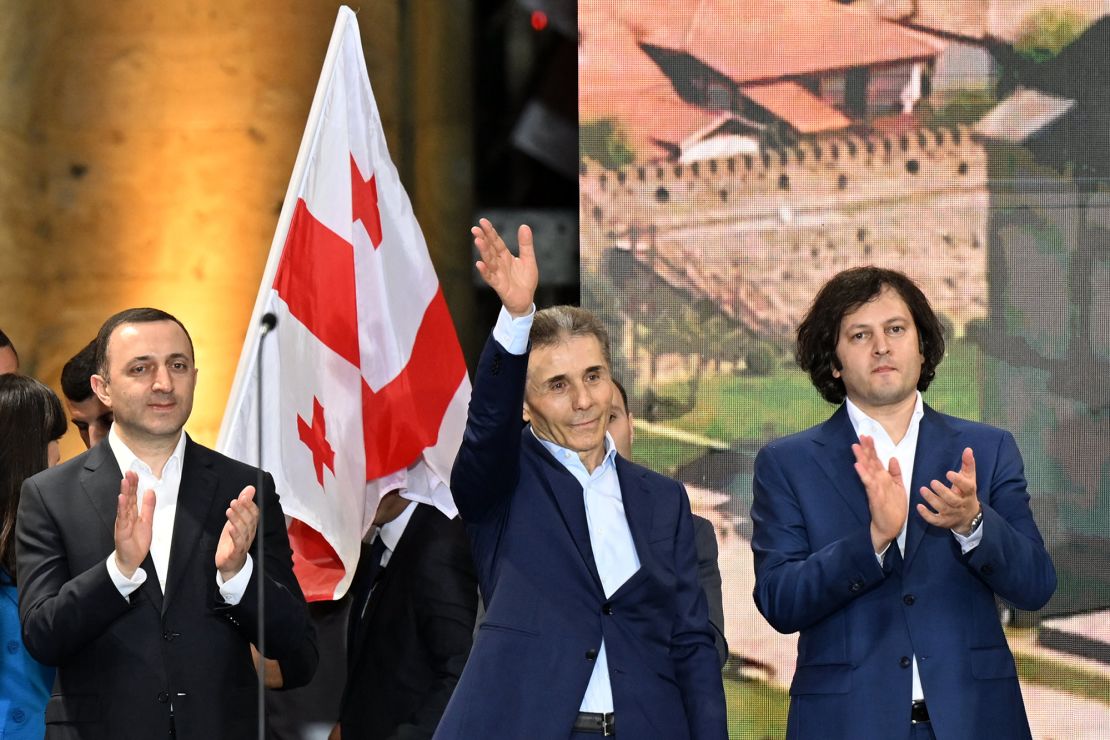 Ivanishvili, center, waves to the crowd during a Georgian Dream rally in Tbilisi, April 29, 2024.