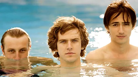 The BBC's 2006 adaptation of The Line of Beauty starred Dan Stevens (centre) as protagonist Nick (Credit: BBC)