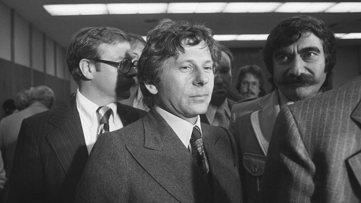 Roman Polanski wears a suit and tie in Santa Monica courthouse