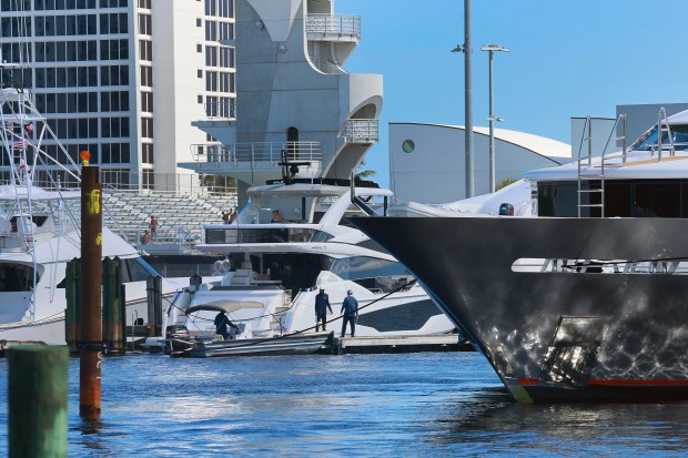 Crew members prepare for the Fort Lauderdale International Boat Show in Fort Lauderdale on Friday, Oct. 25, 2024. The show runs Oct. 30th through November 3rd. (Mike Stocker/South Florida Sun Sentinel)