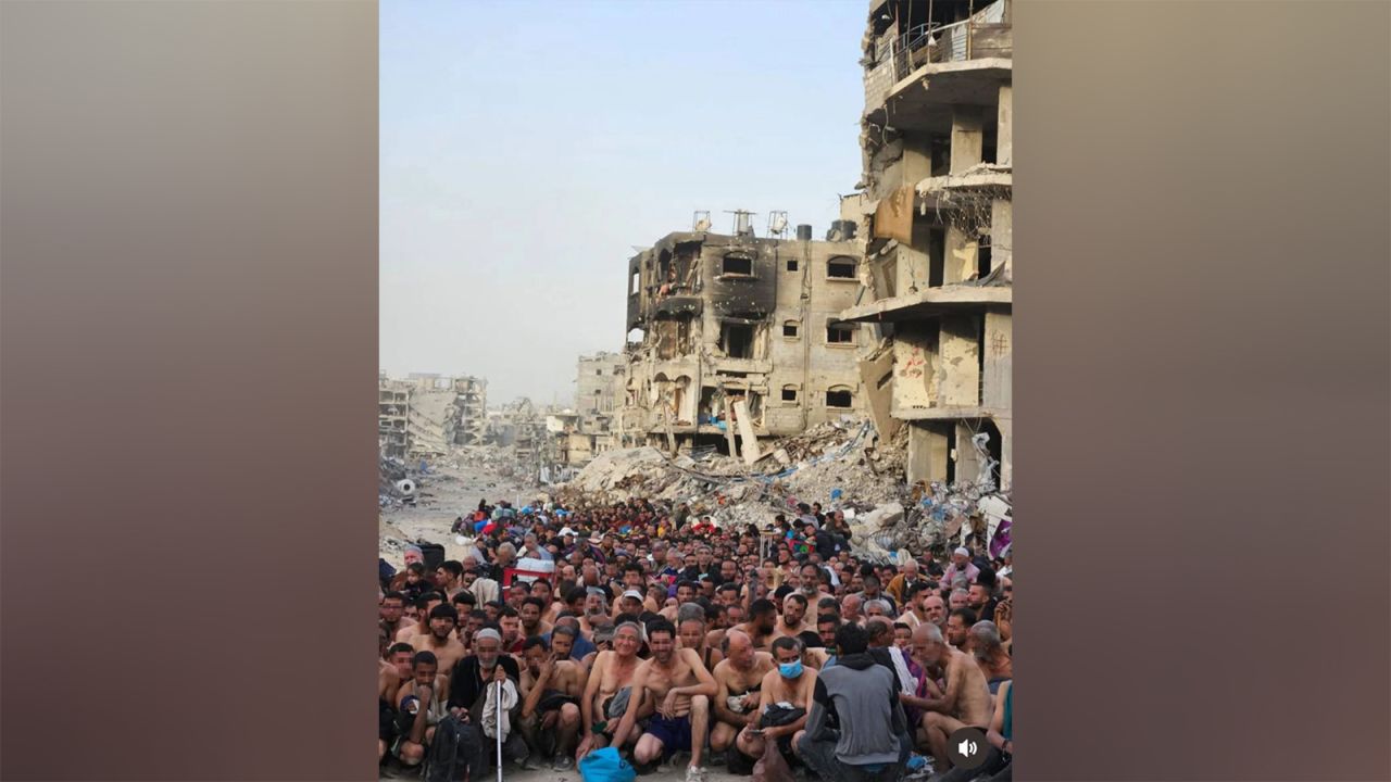 Residents of the Jabalya refugee camp are seen after being detained by the Israeli military as they attempt to flee their homes amid ongoing ground operations, in Jabalya.